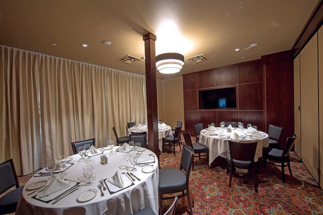 view of Truluck's Arboretum Capri room for the NE corner of the room looking toward the drape covered windows