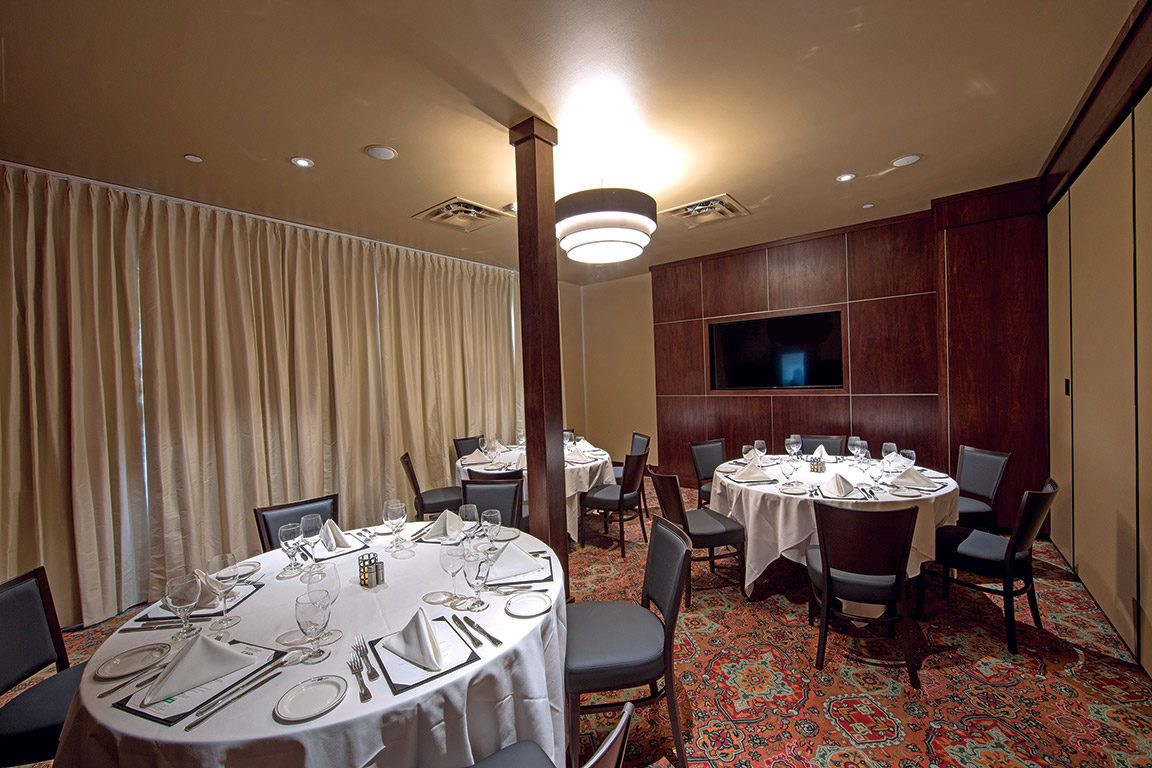 view of Truluck's Arboretum Capri room for the NE corner of the room looking toward the drape covered windows