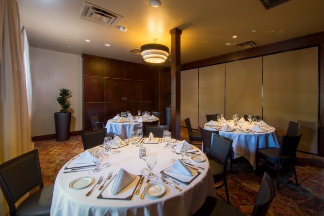 Truluck's Arboretum Atlantic room view from entry door with 3 round tables