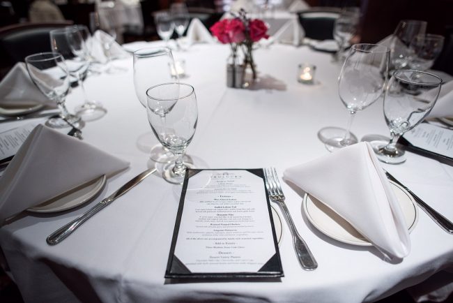 picture of Truluck's private dining table setup with place settings