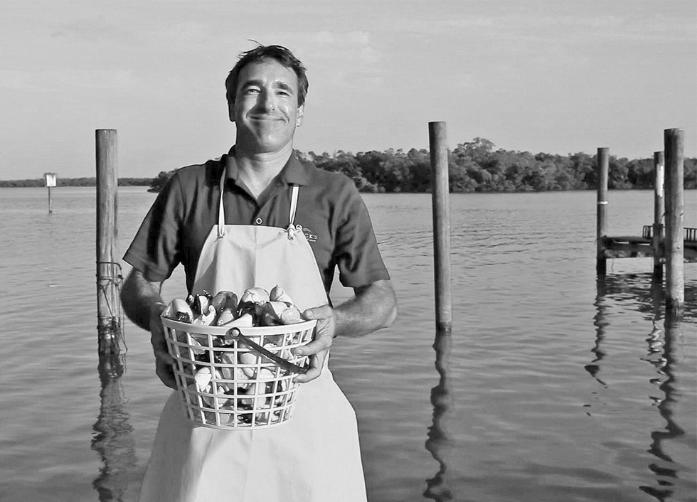 picture of A crabber proudly showing his newest catch