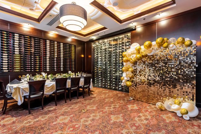 the Brickell room in Miami setup with a sparkly balloon backdrop
