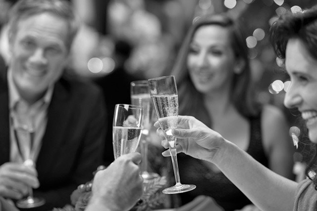 picture of Friends toasting champagne at a party