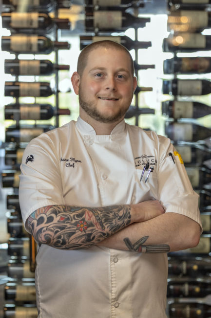 PICTURE OF CHEF PARTNER SHANE FLYNN IN THE RESTAURANT