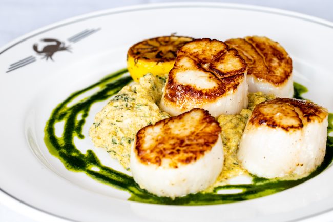 picture of NEW ENGLAND PAN-SEARED SCALLOPS colossal size, with golden beet pesto and herb oil