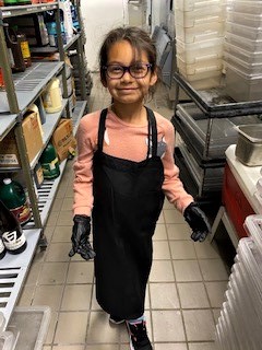 Chef Manuel Vera's daughter in her Chef outfit