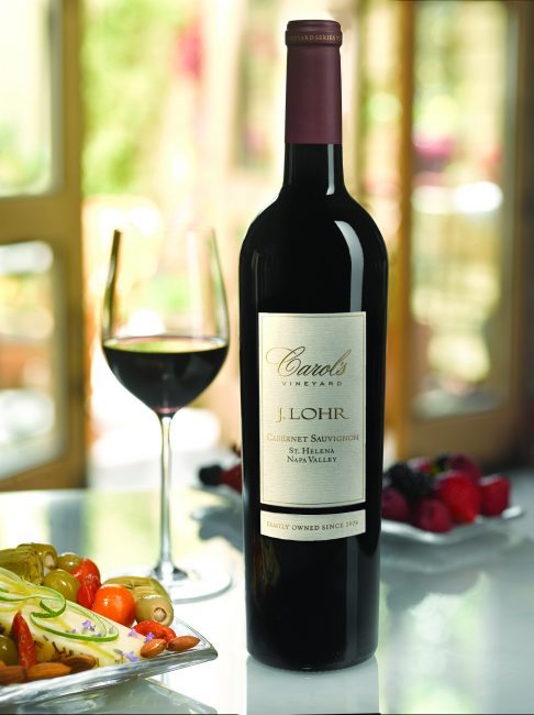 J. Lohr Carol's Vineyard cabernet sauvignon bottle with a glass of wine next to it