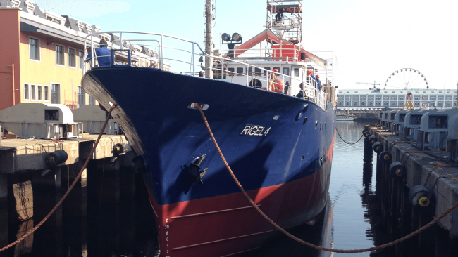 picture of a lobster fishing boat in the dock named RIGEL 4