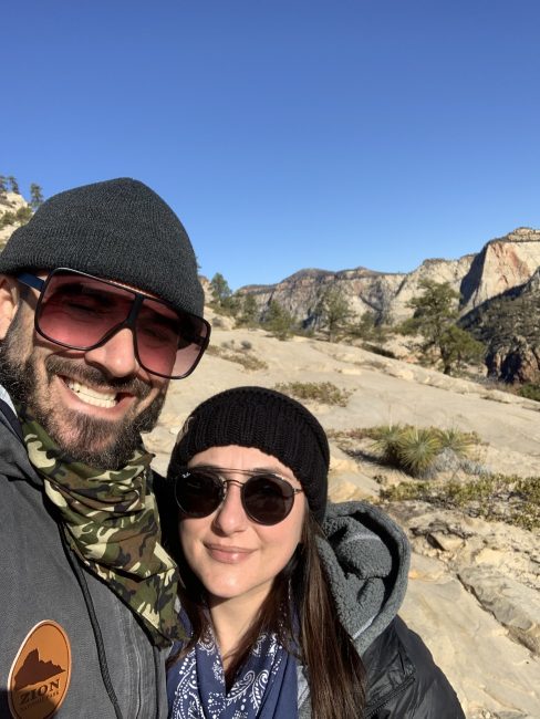picture of Chef Brian Moran with his wife while out on a hike in the mountains