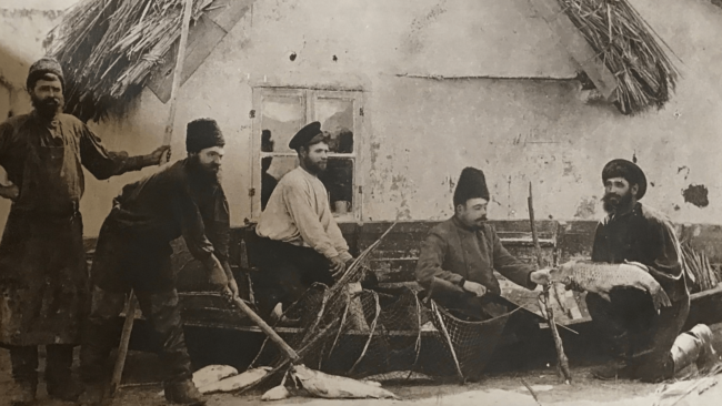 picture of the Petrossian caviar fishermen in a boat in the early 1900s