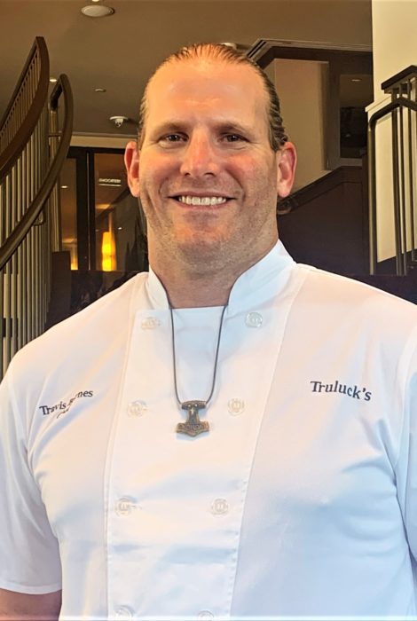 picture of Washington D.C. Chef Travis Barnes in front of the staircase