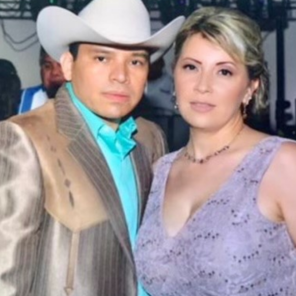 picture of Misael in a cowboy hat with his wife