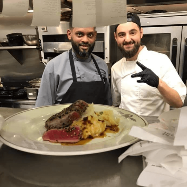 picture of Chef Ricardo and a sous chef on the kitchen line during the shift