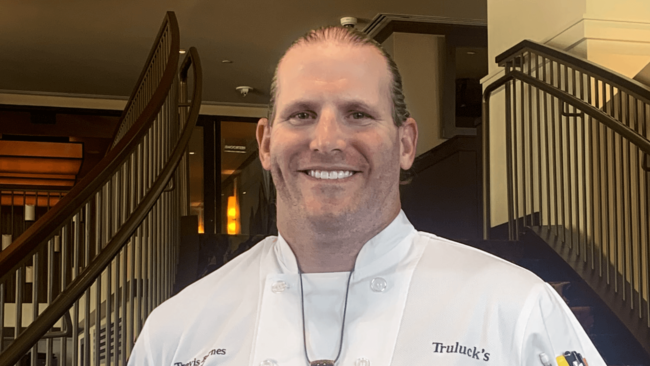 photo of Chef Travis in his Chef coat in the Washington, DC Truluck's location