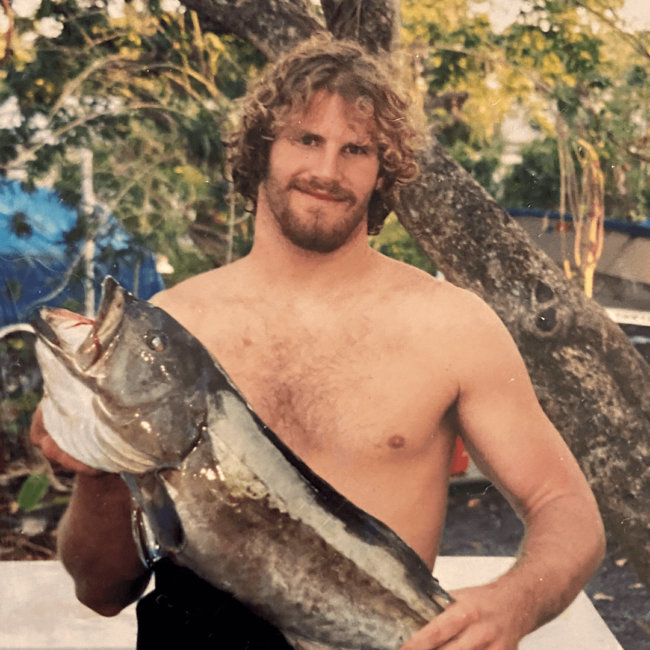 photo of Chef Travis with a fish he caught