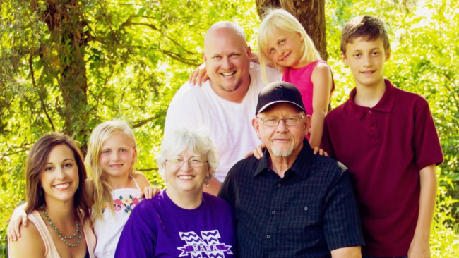 family photo of Cary Grider with parents, wife and children