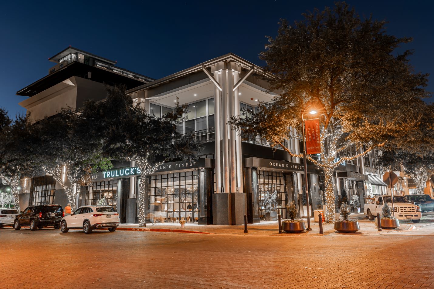 exterior image of Truluck's Ocean's Finest in Plano shot from the corner across the street during twilight