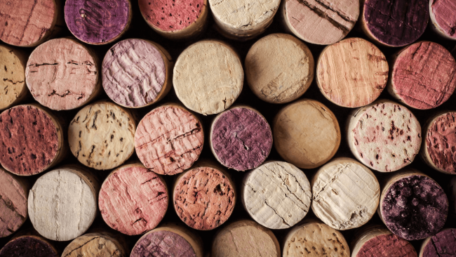 photo of wine corks stacked row after row