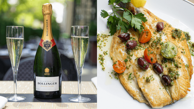 bollinger champagne bottle flanked by two glasses of bubbly champagnes next to a branzino filet with Mediterranean topping