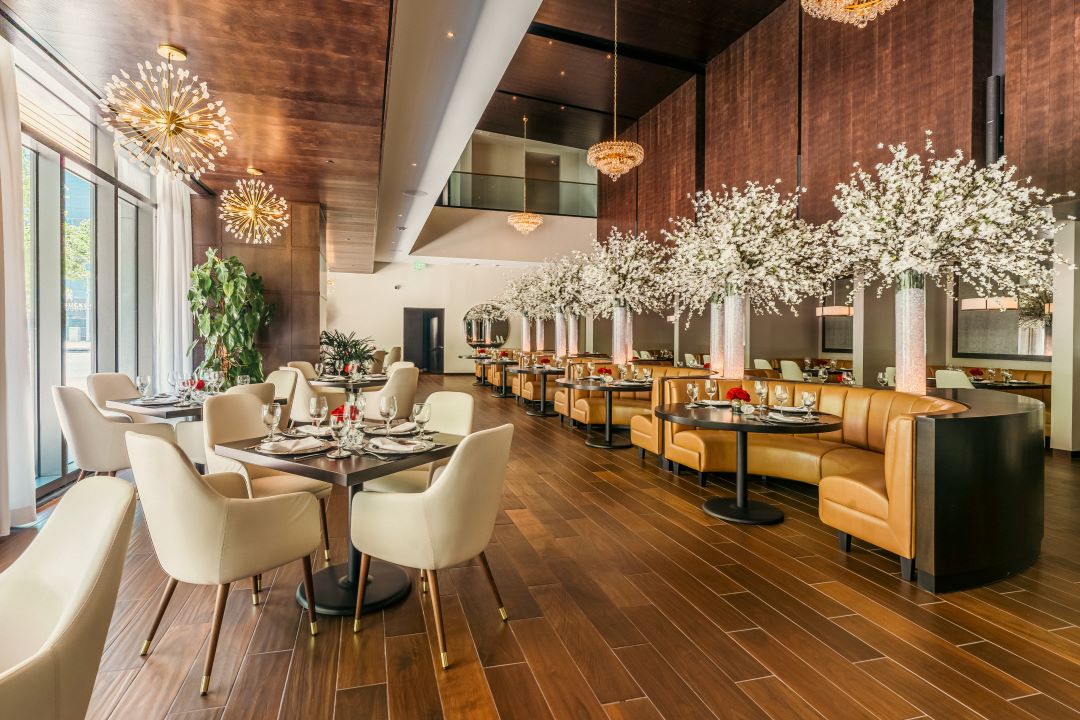 Austin downtown view of the main dining room and the floral tubes and crystal chandeliers