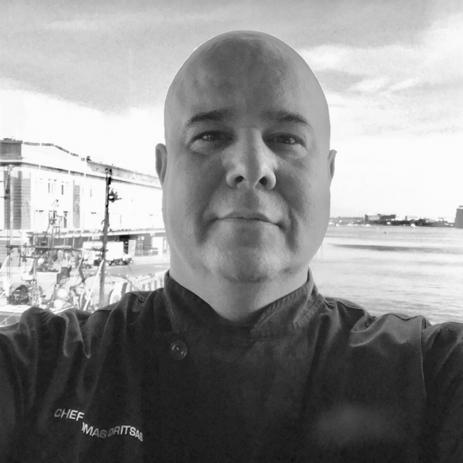 chef thomas with the marina in the background