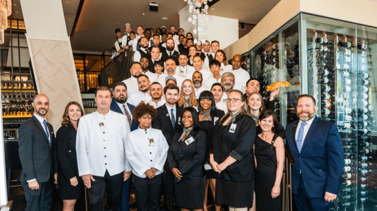 group photo of the Washington DC staff on the stairs in uniform and ready for the shift