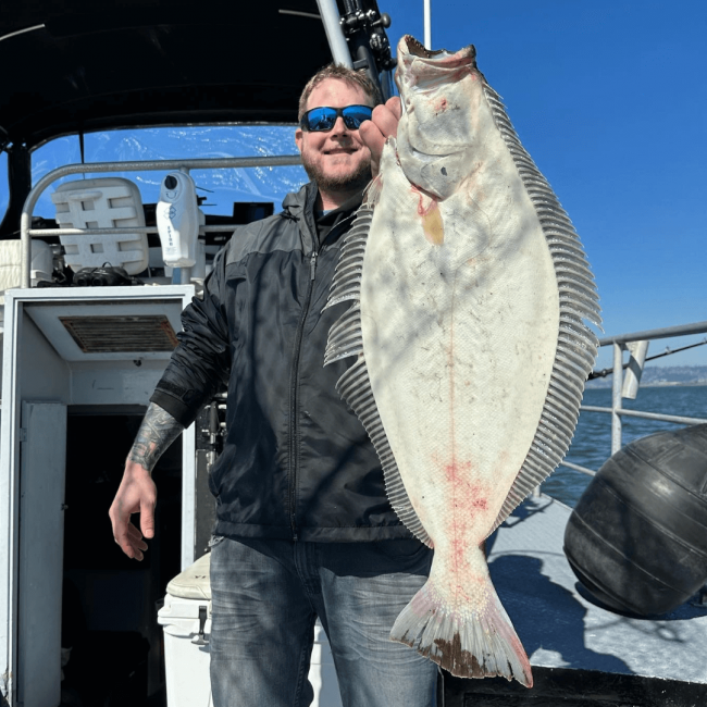 Chef Shane with a large fish he just caught