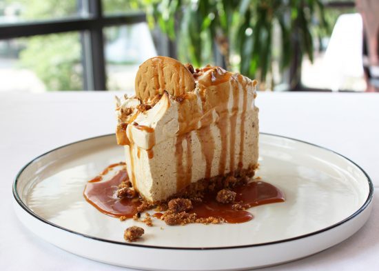 PUMPKIN SPICE CHEESECAKE drizzled in caramel sauce