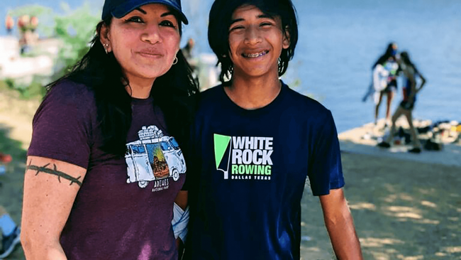 Paula and her son at the beach on vacation