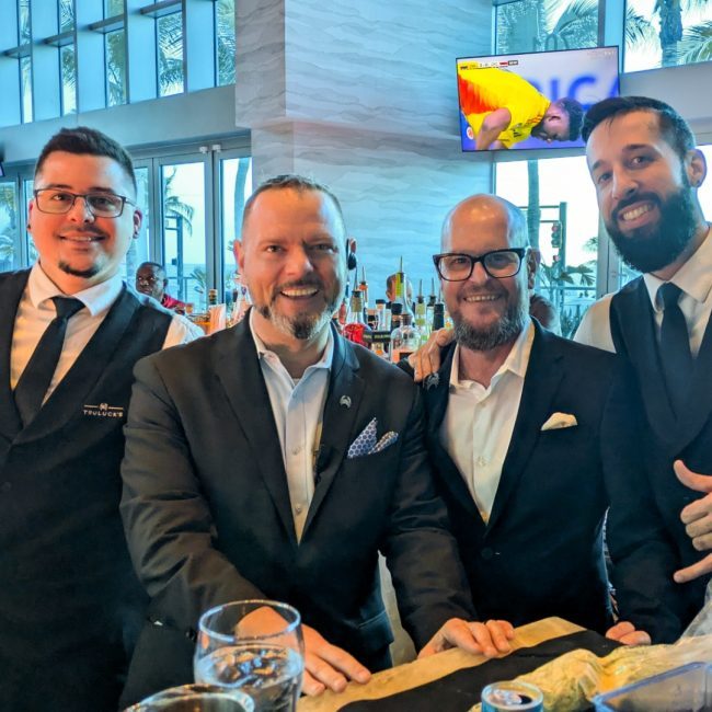 Fort Lauderdale beverage manager, Jason Johnson, alongside fellow team members behind the bar