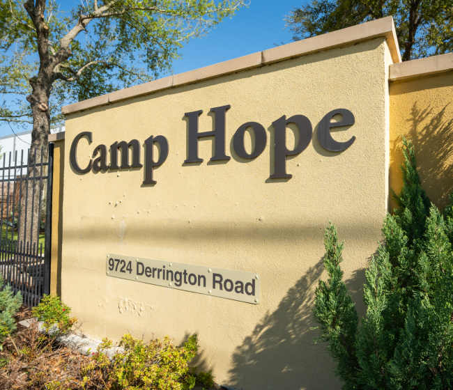The entryway sign that says 