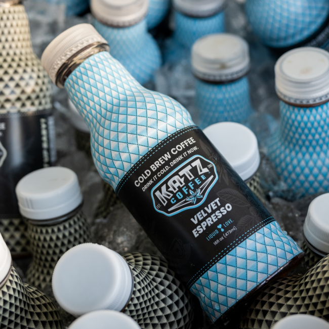 Katz coffee cold brew coffee pre packaged "velvet espresso" in a plastic bottle with a blue and white label