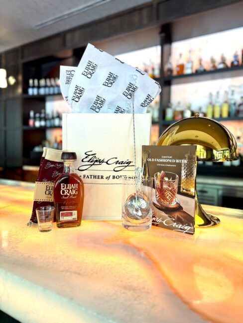 A father's day canvas gift bag with Elijah Craig