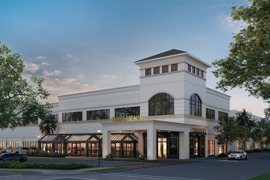 Architectural rendering of the Truluck's Houston Town & Country restaurant exterior at dusk, featuring a two-story white façade with gold signage, arched windows, glass-enclosed patio dining, and an illuminated grand entrance