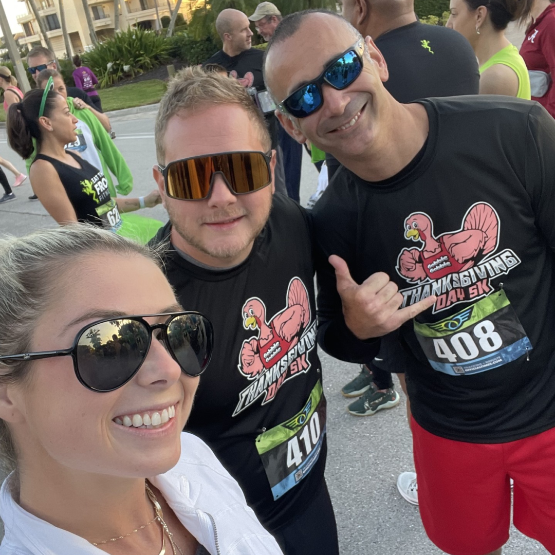 Johnny Griesedieck of Truluck’s Naples posing with friends before a Thanksgiving Day 5K race.