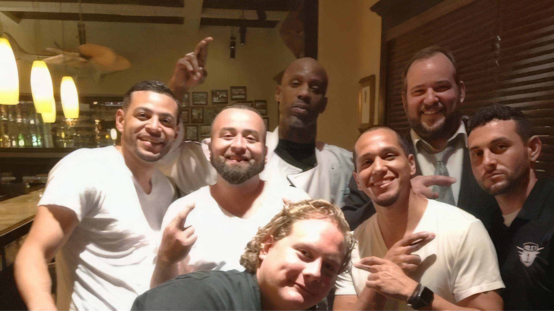 Johnny Griesedieck of Truluck’s Naples pictured with fellow team members inside the restaurant.